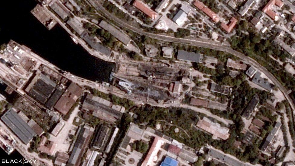 A satellite photo shows Sevastopol, Crimea after a Ukrainian missile attack, on September 12, 2023, with two blackened ships in the middle