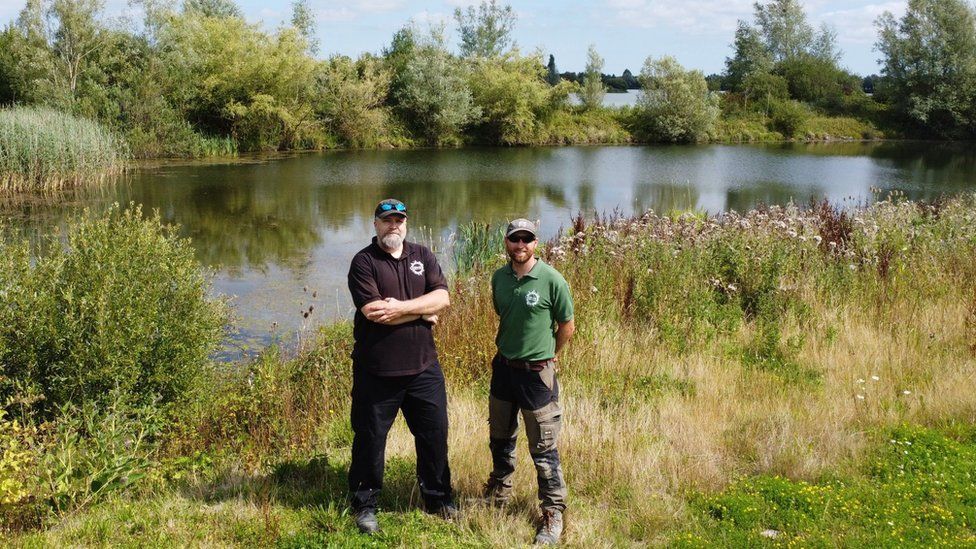Ben Welbourn (l) from the water park and Head Ranger Kieren Thomas