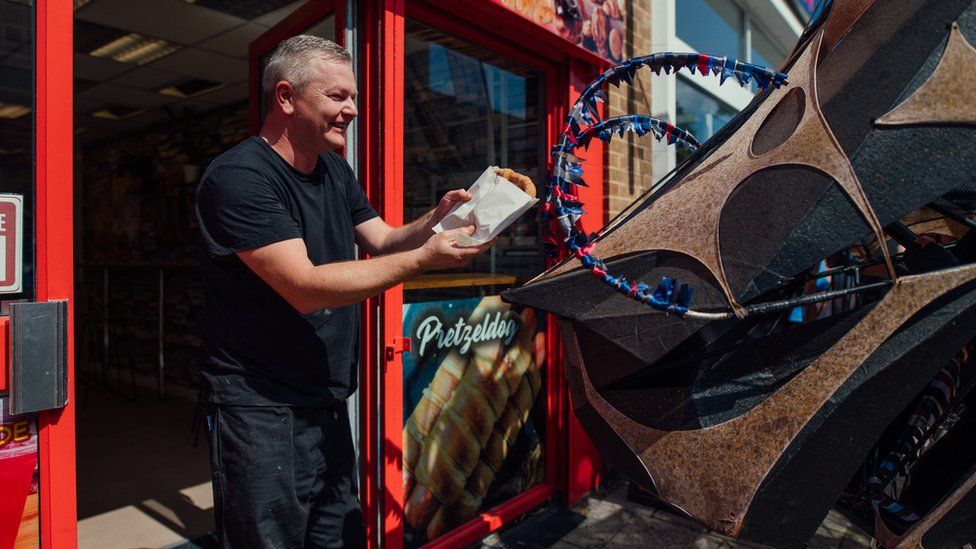 Giant dragon puppet show draws crowds to Plymouth BBC News