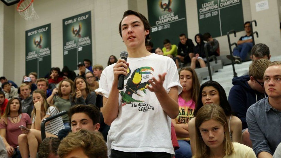 Free State High School student Chris Pendry asks as question during a forum with the four teenage candidates for Kansas Governor at Free State High School in Lawrence, Kansas.