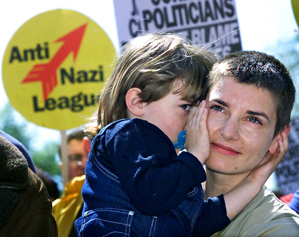 Sinead O'Connor hugs her daughter Roisin during an Anti-Racism demonstration in Dublin city centre, Ireland, on 13 May 2000