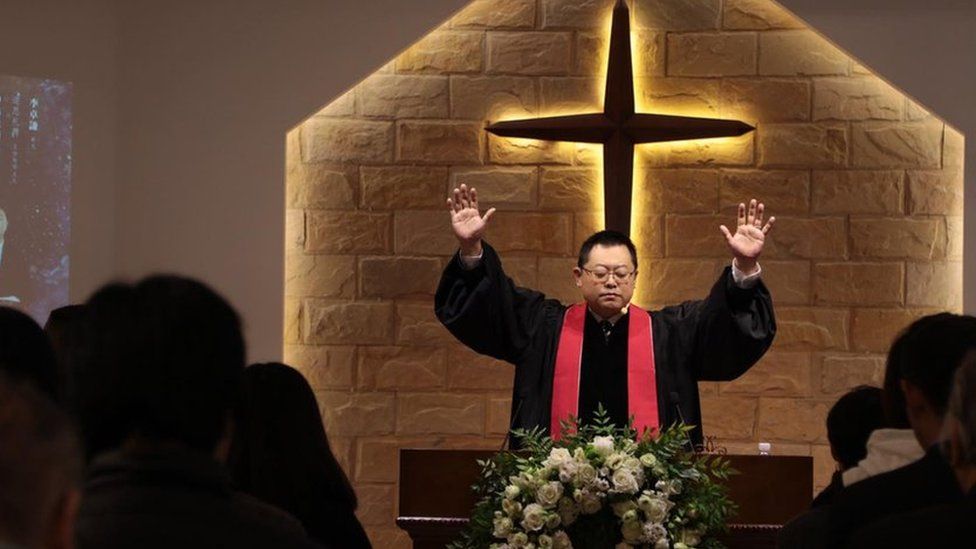 Wang Yi preaching at Early Rain Covenant Church