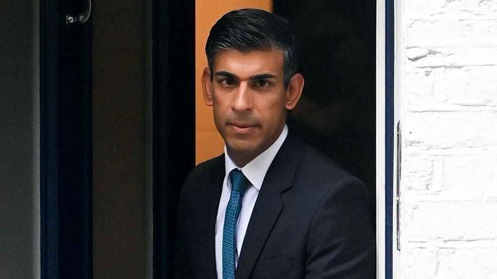 Rishi Sunak pictured outside his home on Friday