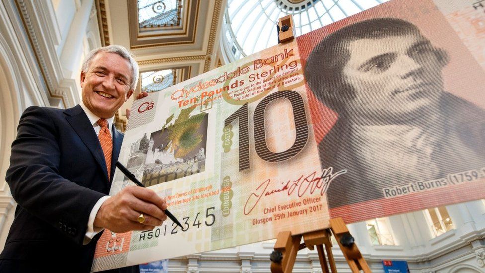 Clydesdale Bank chief executive officer David Duffy signs first £10 polymer note