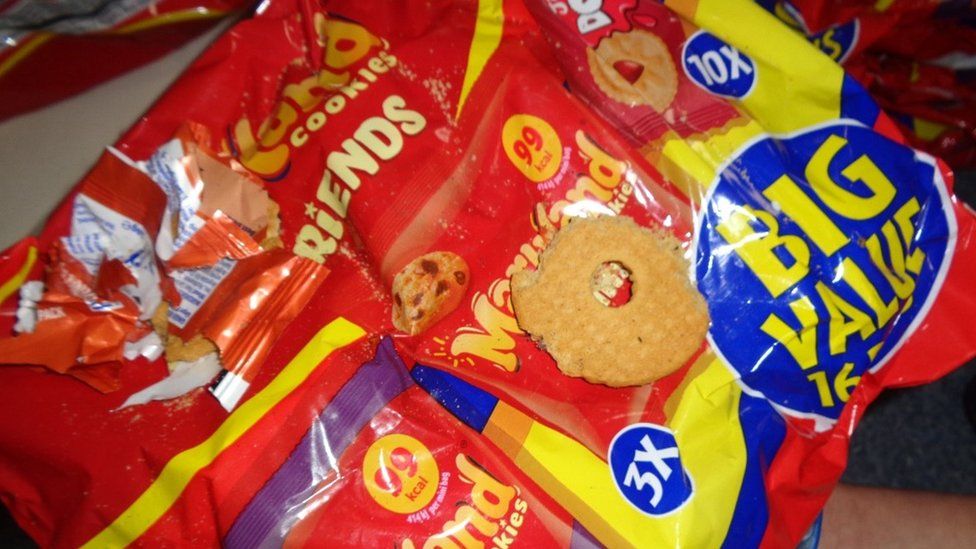 A packet of biscuits partially eaten