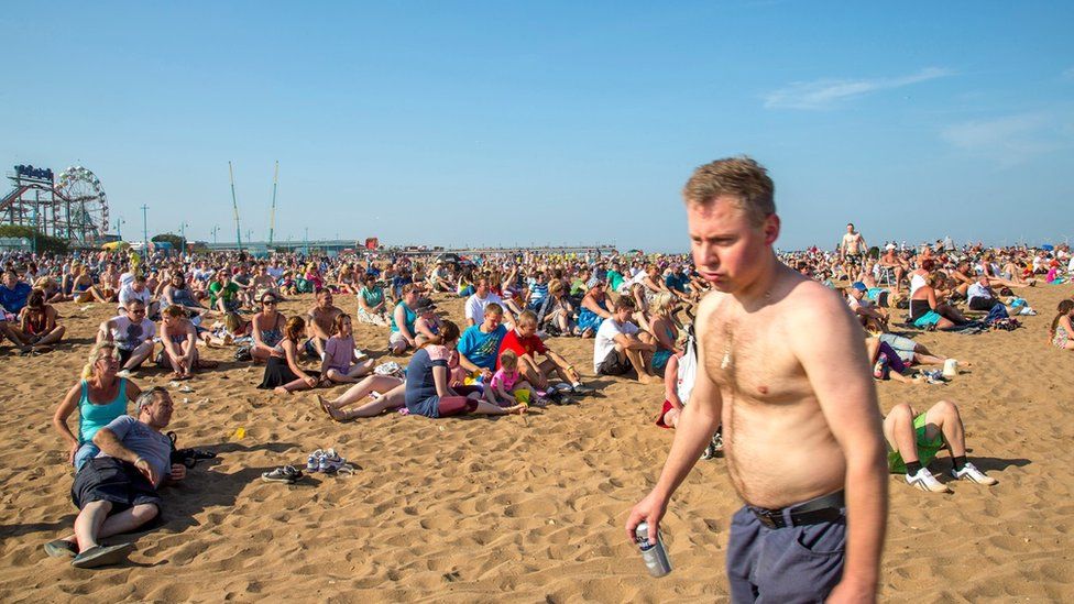 People on the beach in Skegness