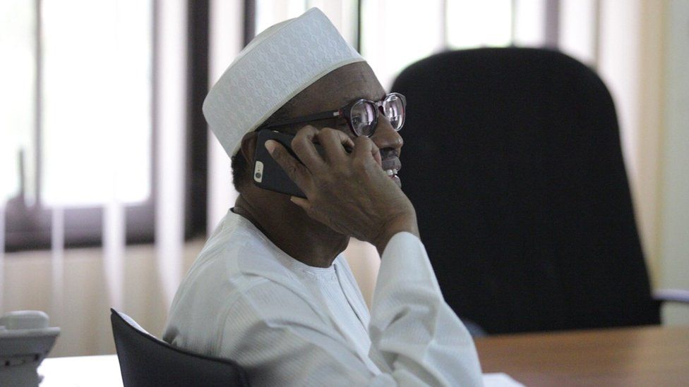 Muhammadu Buhari speaking on the phone to Goodluck Jonathan after winning the Nigerian presidential race, 31 March 2015