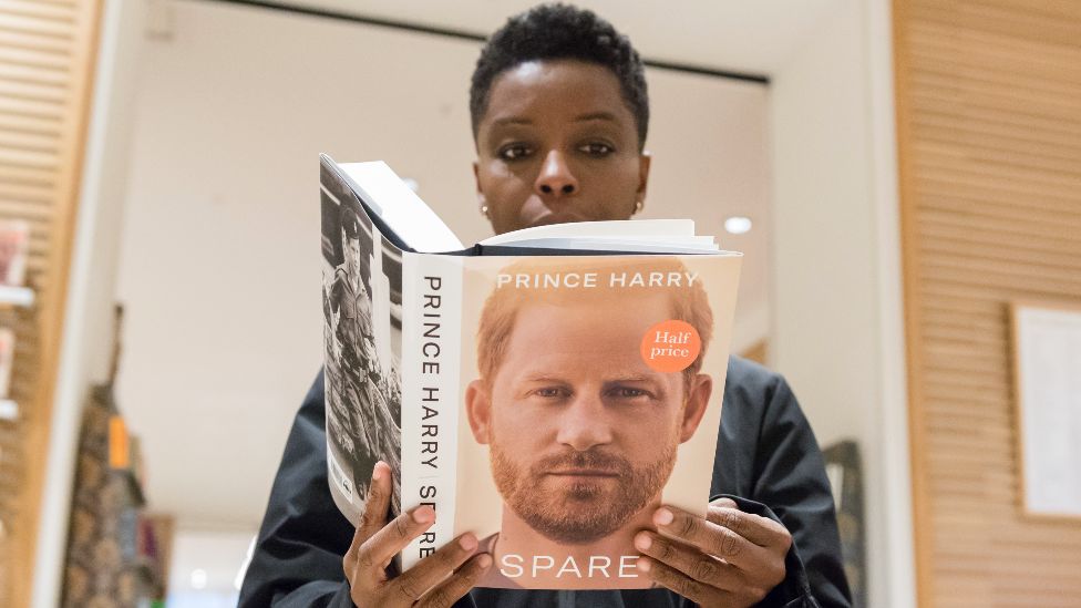 A customer reads Prince Harry's memoir Spare at a bookshop in central London on the day of its official release in London, the United Kingdom on 10 January 2023