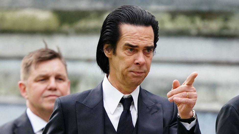 Nick Cave arriving ahead of the Coronation of King Charles III and Queen Camilla