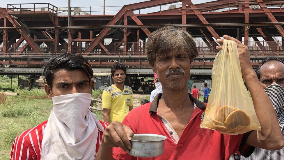 Rickshaw puller Sarathi Sarkar lives in a shanty under a river bridge in Delhi