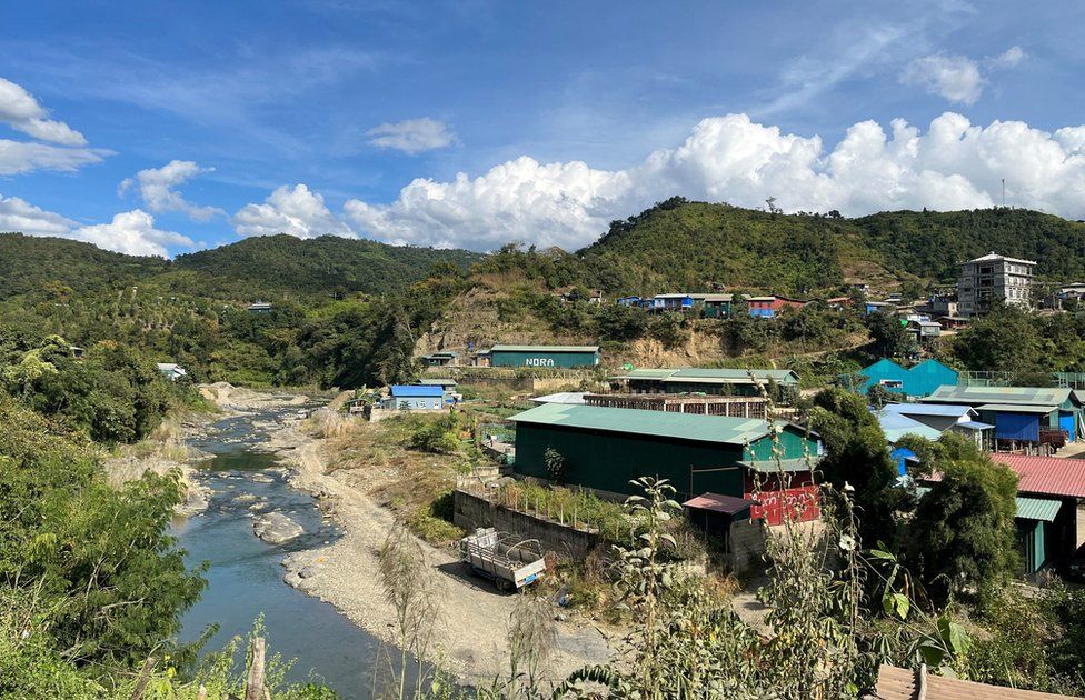 A view of Myanmar's Khawmawi village on the India-Myanmar border across the Tiau river as seen from Zokhawthar village in Champhai district of India's northeastern state of Mizoram, India, November 14, 2023