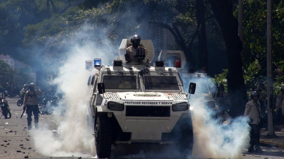 Demonstrators clash with police during a protest in Caracas, Venezuela, 08 April 2017