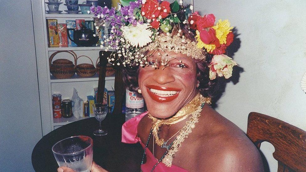 Transgender icon Marsha P Johnson wearing a rose crown of flowers