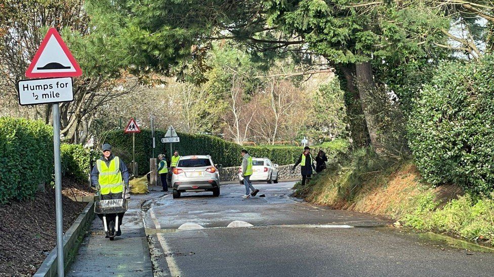 Volunteers clearing up road in St Brelade