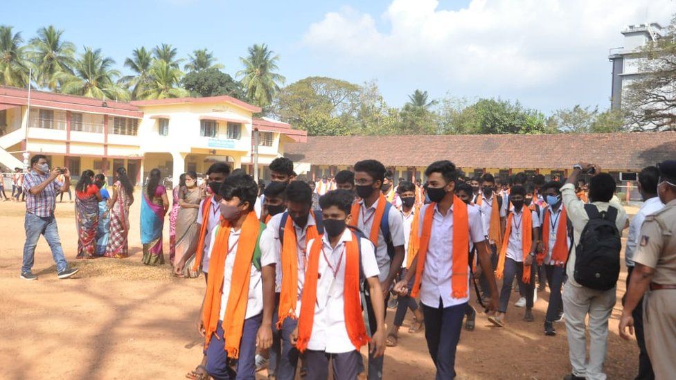 Hindu students wearing saffron shawls at Byndoor