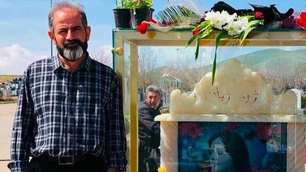 Ms Amini's father (pictured) was reportedly detained outside his home after the family indicated that they planned to gather at her grave on the anniversary of her death