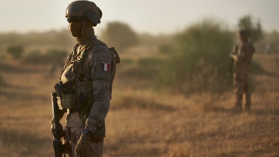 French soldiers monitor a a rural area during an operation in northern Burkina Faso along the border with Mali and Niger - 10 November 2019