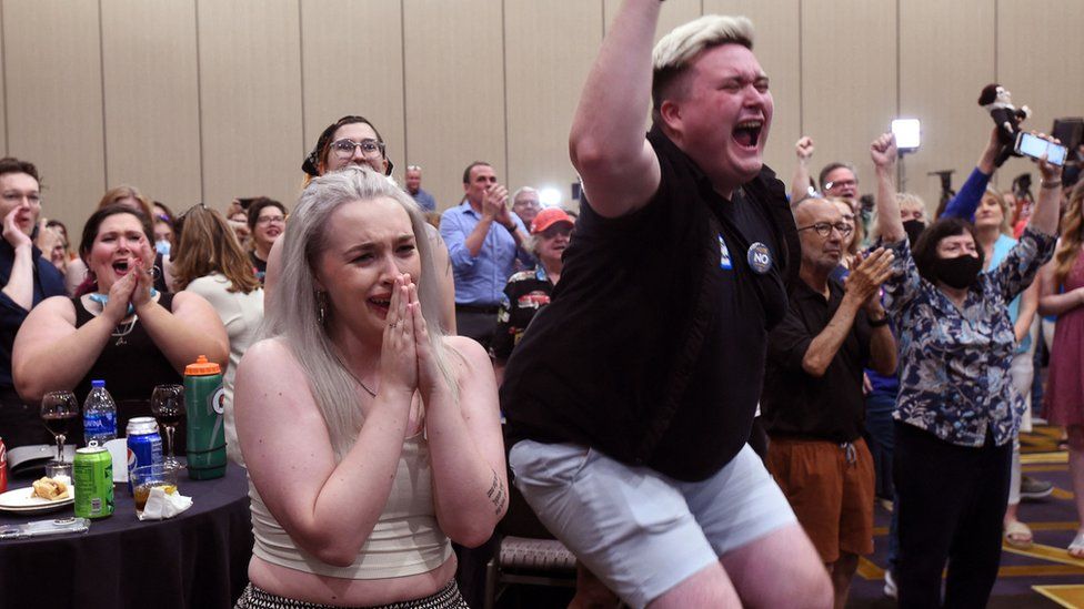 Abortion supporters react to the result at a watch party in Overland Park, Kansas