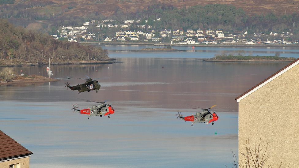 Royal Navy Sea King helicopters fly over Fort William
