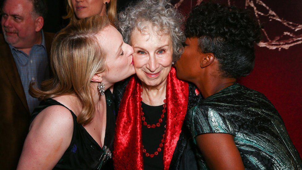 The Handmaid's Tale TV stars Elisabeth Moss (left) and Samira Wiley with Margaret Atwood