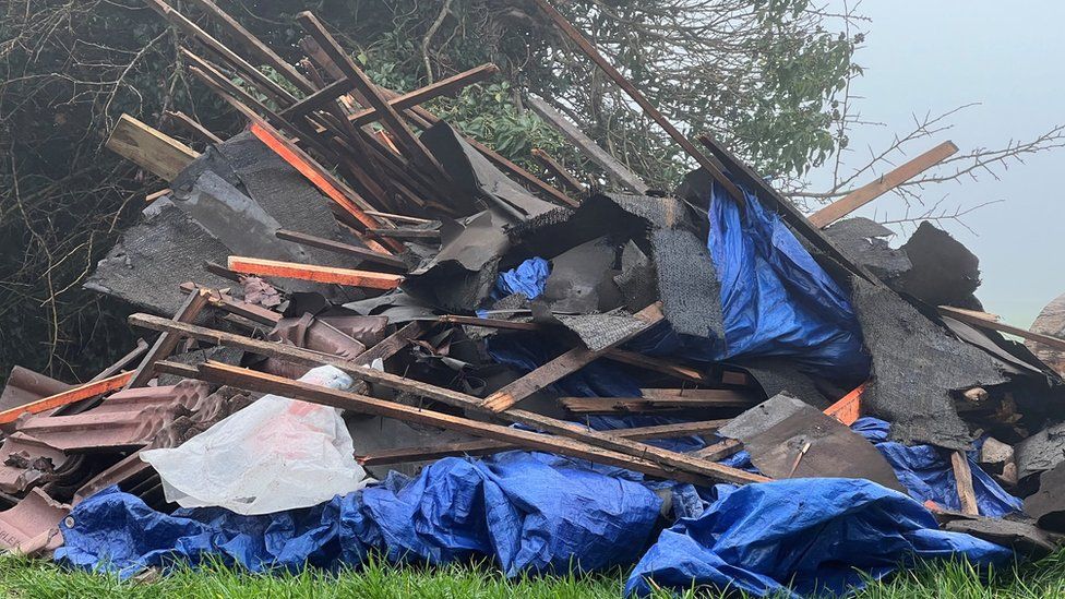 A pile of fly-tipped waste on Wiltshire farmland