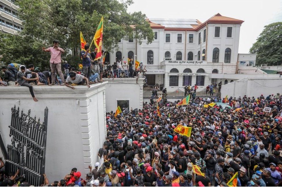 Protesters shout slogans in front of the president"s official residence premises during the anti government protest in Colombo, Sri Lanka, 09 July 2022.