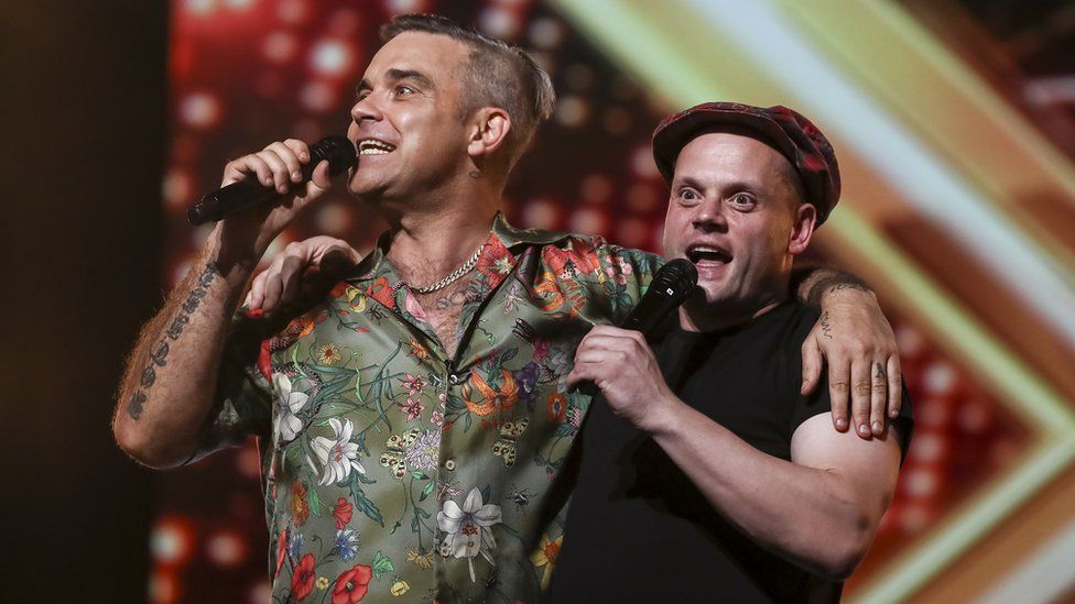 Robbie Williams and Andy Hofton on The X Factor