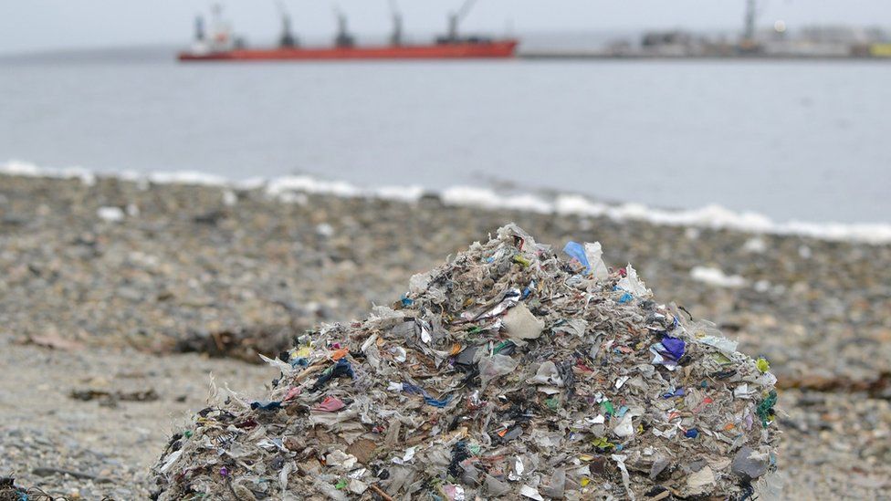 A pile of plastic on a beach
