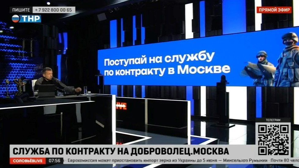 Pro-Kremlin commentator Vladimir Soloviev appears on his TV show advertising military service