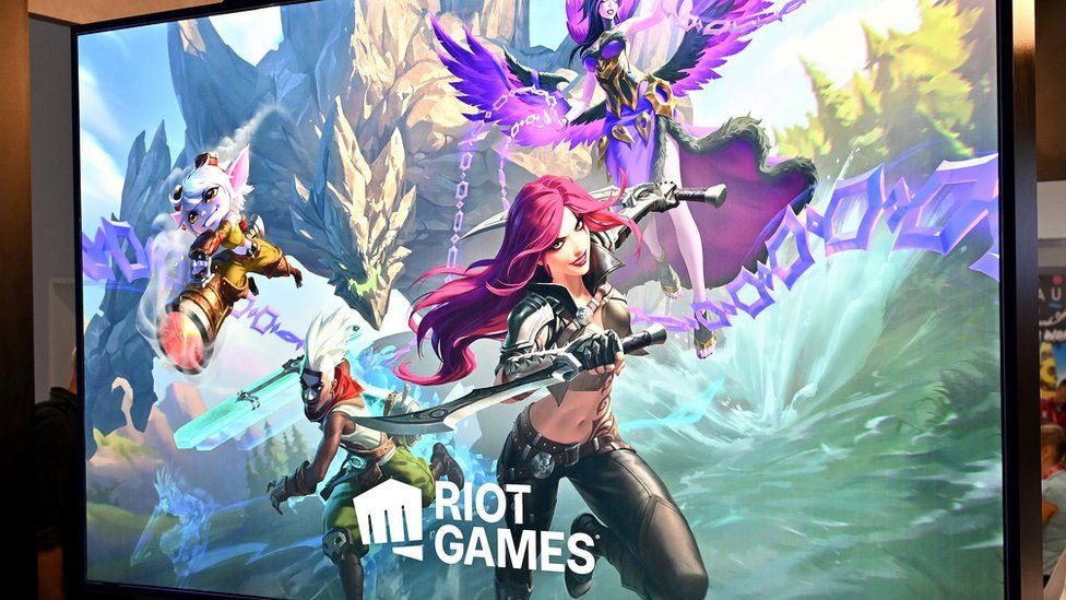A poster showing Riot games characters is displayed during the Brand Licensing Europe at ExCel.