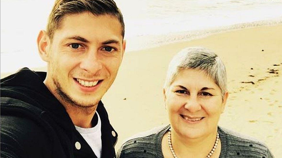 Picture of Emiliano Sala and his mother Mercedes on a beach. It was the last time she saw her son