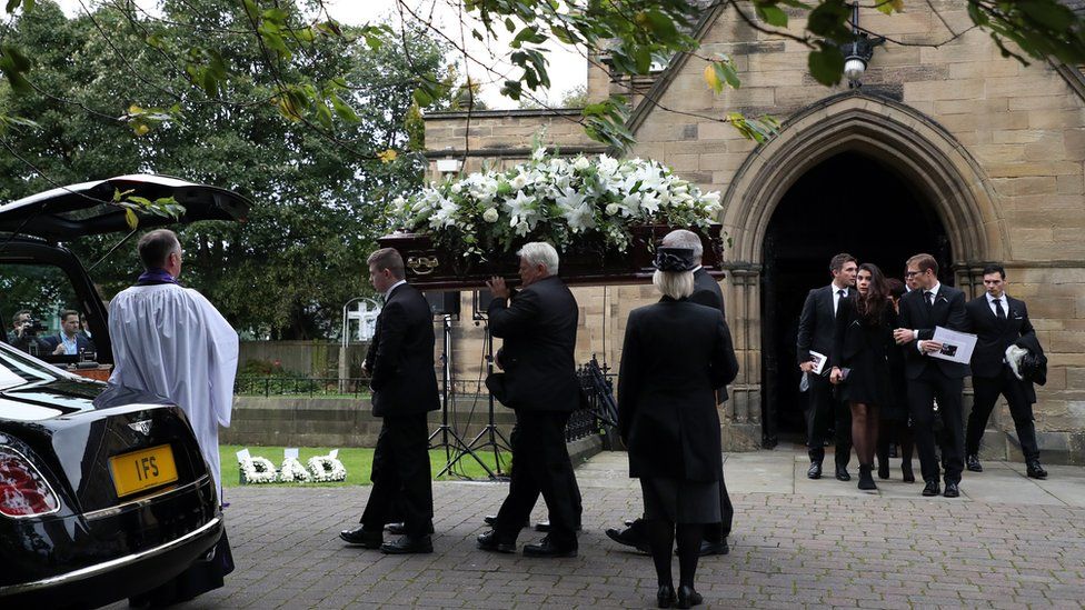 Mr Shepherd's coffin is carried out of the church