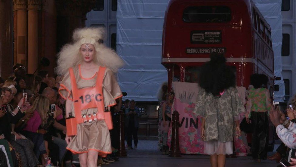 A model walking the runway at London Fashion Week