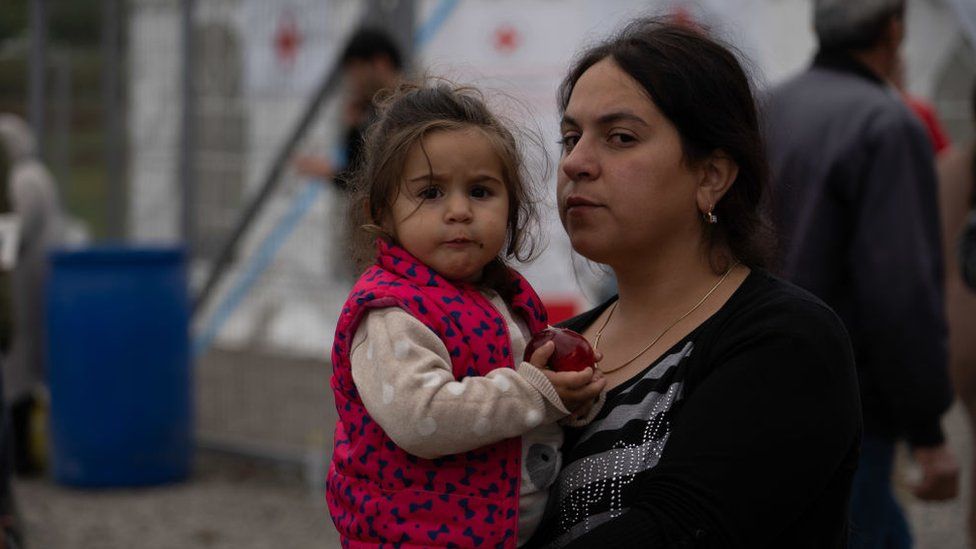 A mother and her child evacuated from Nagorno-Karabakh