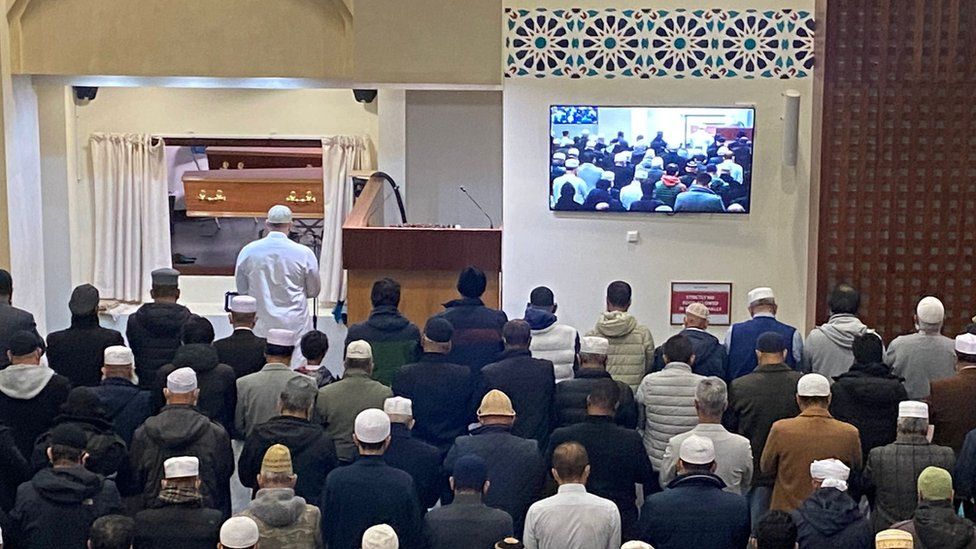 Funeral service inside East London Mosque.
