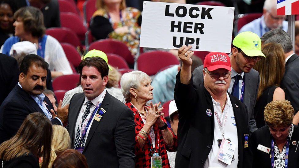 Trump supporter with 'Lock Her Up' sign