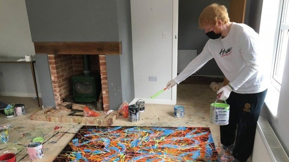 Ed Sheeran working on the painting Dab 2, which is up for auction for charity