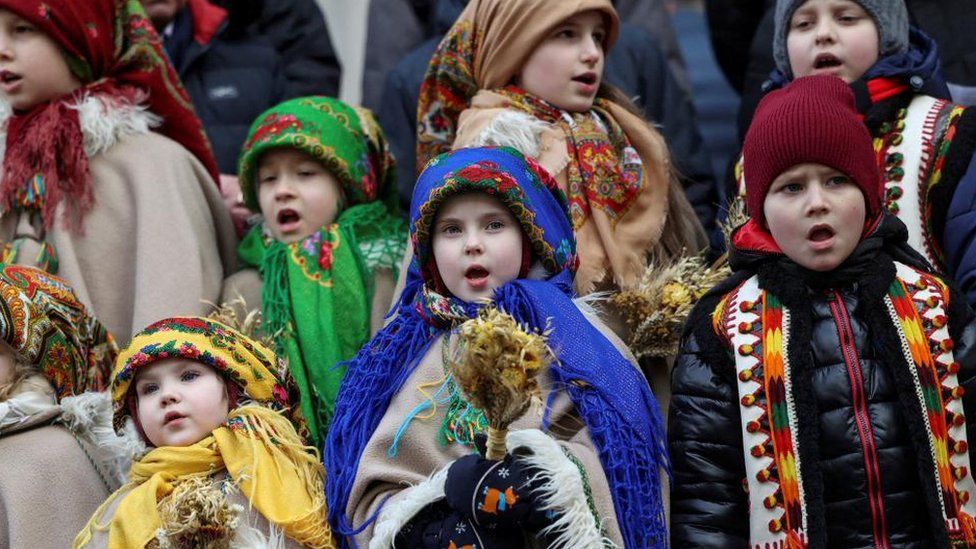 Children dressed in Ukrainian traditional costumes attend a Christmas celebration, amid Russia's attack on Ukraine, in Lviv, Ukraine December 24, 2023.