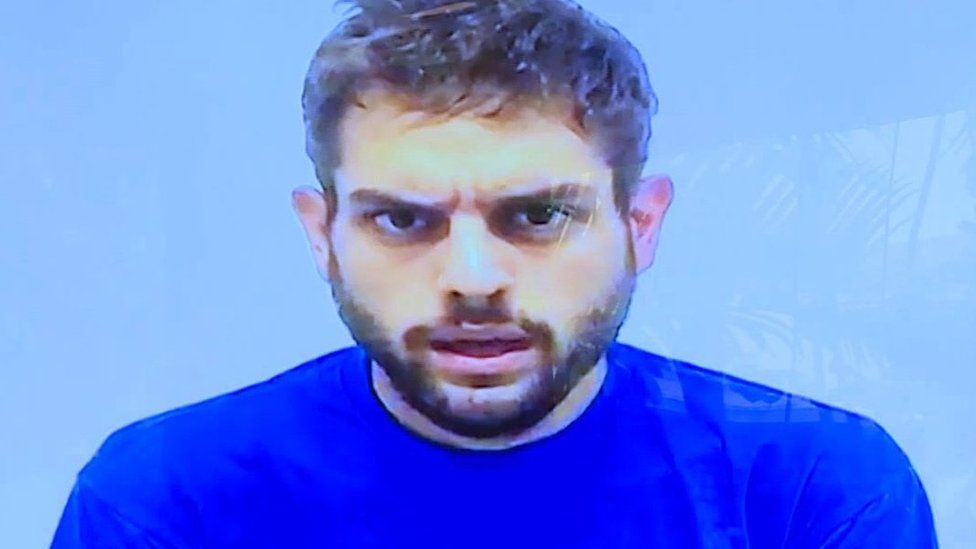 This TV grab shows opposition Venezuelan lawmaker, Juan Requesens in detention as he admits on a video broadcasted by the Venezuelan government on August 8, 2018 to have had contact with one of the suspects of the alleged plot against Venezuelan President Nicolas Maduro.