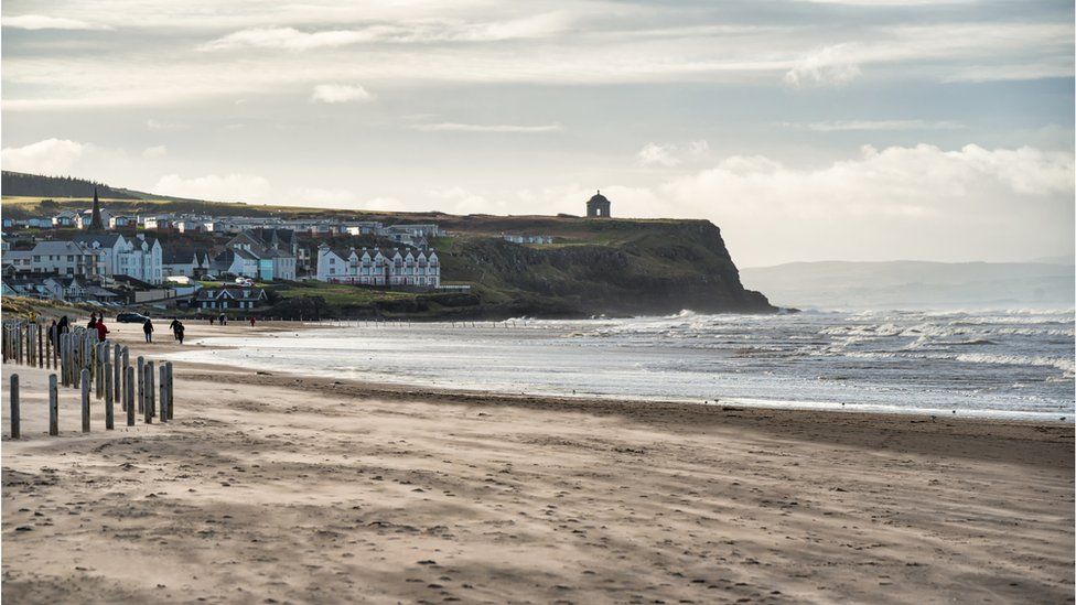 The formation  astatine  Castlerock successful  Northern Ireland. The Mussenden Temple tin  beryllium  seen astatine  the apical  of the oversea  cliff successful  the distance