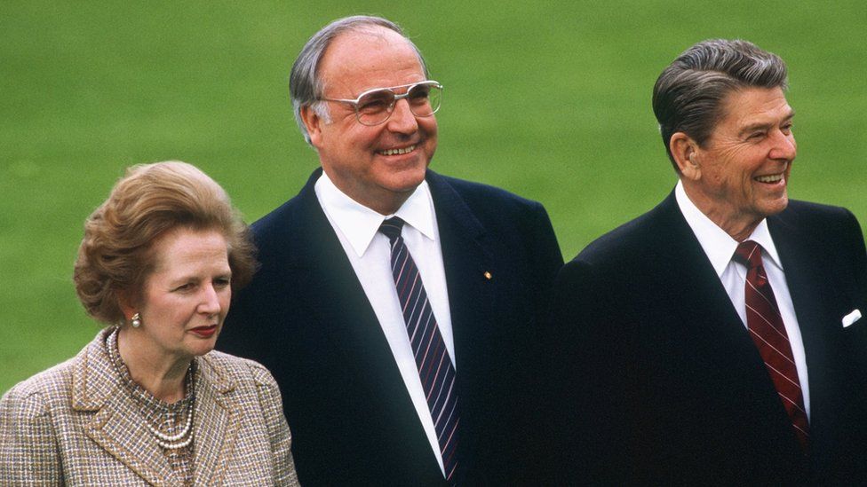 A file picture dated 03 May 1985 shows (L-R) British Prime Minister Margaret Thatcher, German Chancellor Helmut Kohl and US President Ronald Reagan attending an event at the World Economic summit in Bonn, Germany