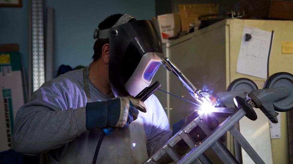 File pic of a worker welding