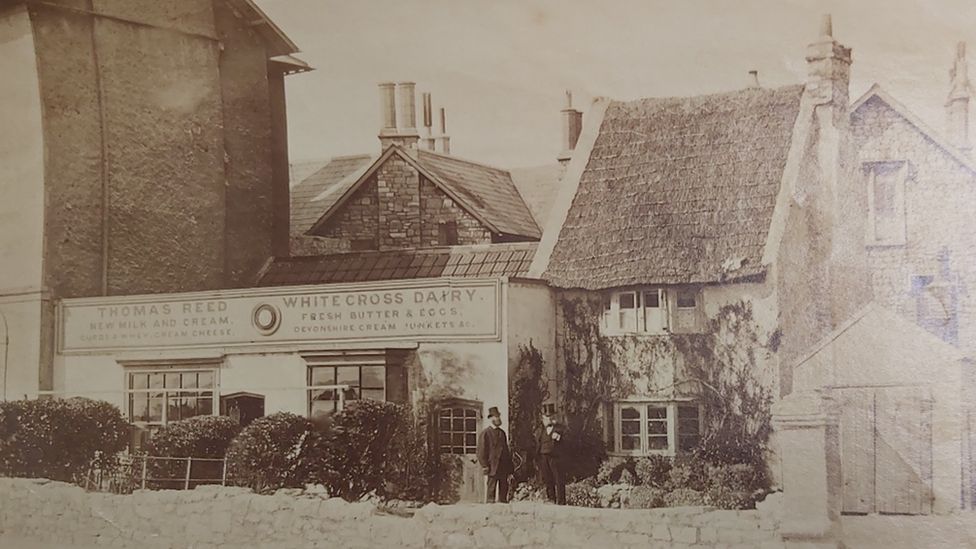 A black and white picture of the building in the 1800s when it was a dairy