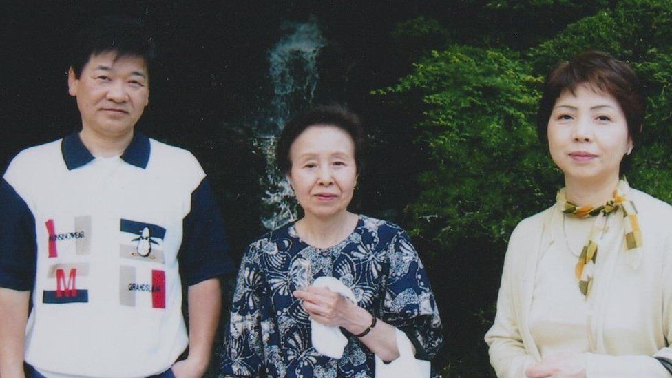Michiko later in life with her daughter, Sanae, and Sanae's husband, Nobuo Hamada