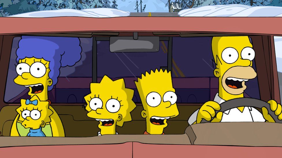 The Simpsons in a car