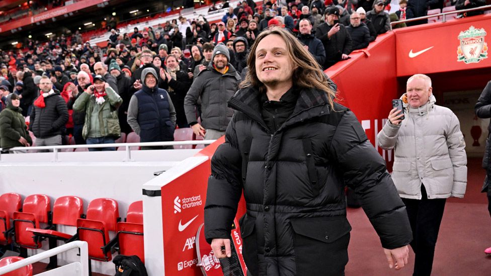 Jamie Webster singer from Liverpool during half time of the Emirates FA Cup Fourth Round match between Liverpool and Norwich City at Anfield on January 28, 2024