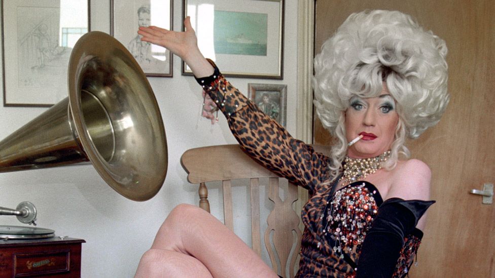 File photo dated 16/08/93 of Paul O'Grady, as Lily Savage, at home in south London
