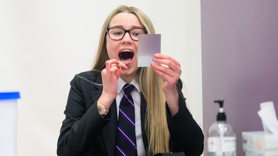 Pupils tests herself for Covid