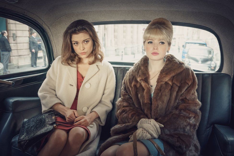 Sophie Cookson playing Christine Keeler and Ellie Bamber playing Mandy Rice-Davies
