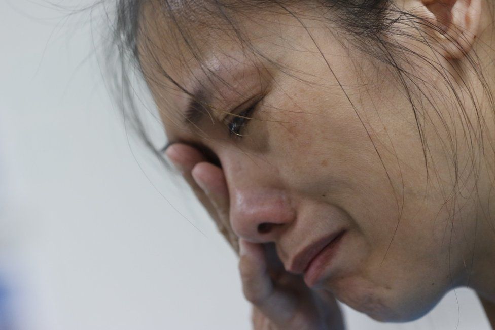 Ms Chien's colleague Winnie Lai in tears
